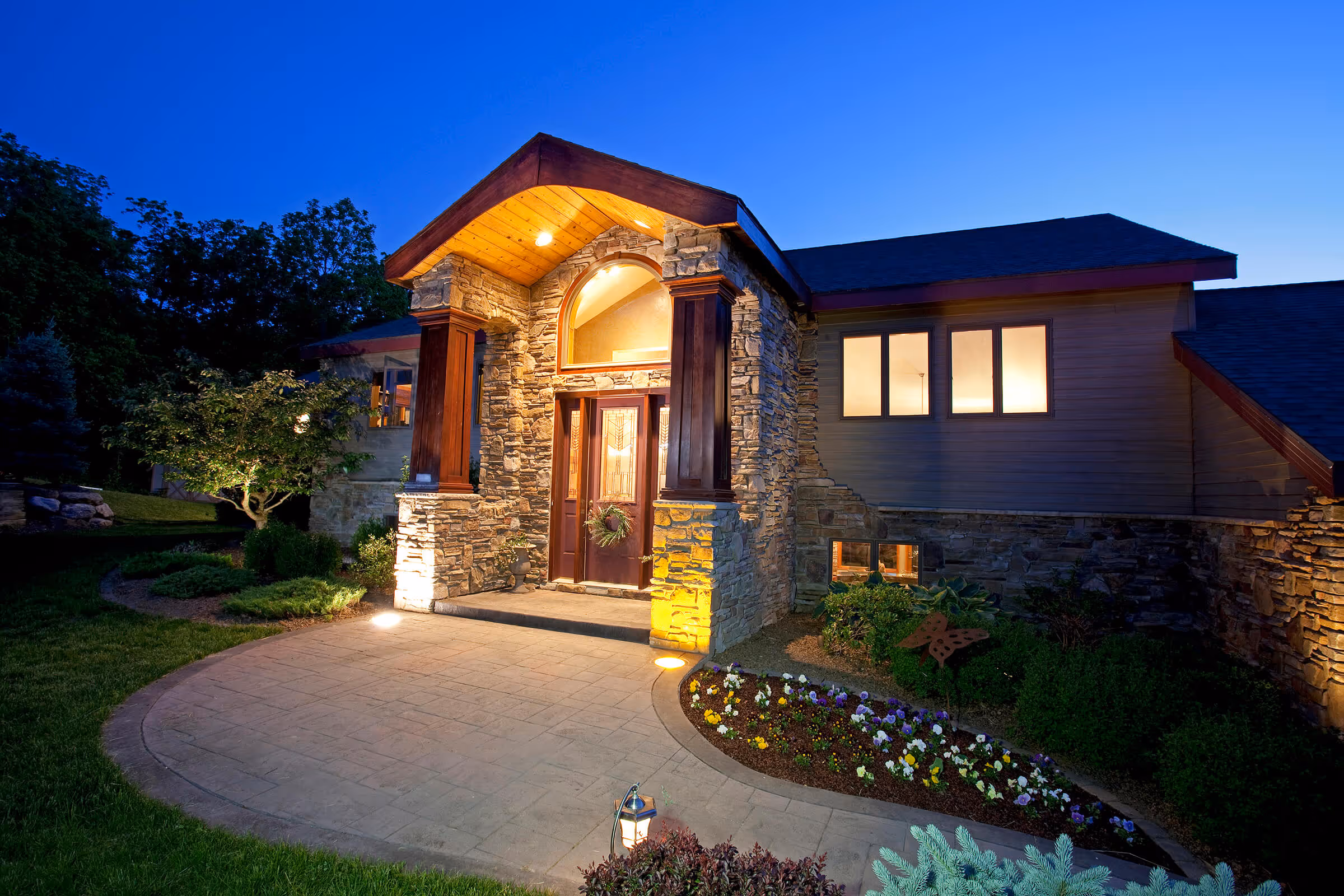 Photo of a beautifully landscaped exterior of a home